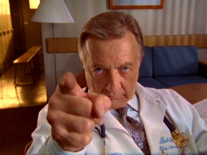 Sacred Heart's chief of medicine Dr. Bob Kelso illustrates his very limited knowledge of sign language.