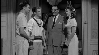 Wilby and local rounder Buzz Miller (Tim Considine) meet the worldly Franceska Andrassy (Roberta Shore) and her mustachioed father Mikhail (Alexander Scourby).