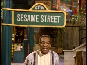 A Jell-O pudding pop in each hand wouldn't make Bill Cosby any happier to host this 20th anniversary Sesame Street special.