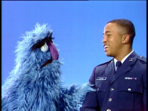 Fifteen years later, Herry Monster does some more counting with John-John or, as he's now known, John Williams (III), U.S. Air Force Cadet.
