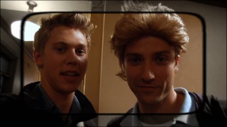 Austin Butler steps in front of his camera to stand next to his bewigged stand-in.