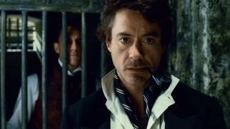 Sherlock Holmes (Robert Downey Jr.) has his Clarice Starling moment when he honors a death row inmate's request for a final visit.