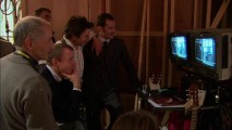 In "Sherlock Holmes: Reinvented," director Guy Ritchie and actors Robert Downey Jr. and Jude Law gleefully look over the dailies of a light-hearted scene.