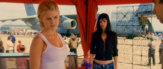 At an air show she's planned, Molly (Alice Eve) listens to Kirk explain the awkward first impression he made on her family.