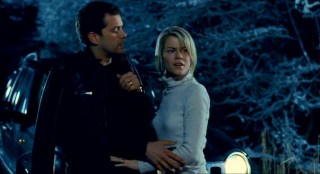 Jane (Rachael Taylor) is slightly confused as to where the body she hit may have run off to. Benjamin  (Joshua Jackson) seems unfazed, but not enough to suggest actually looking under their car.