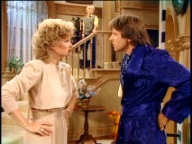 Clever framing reflects the situation, as Ricky is literally between Edward and ex-wife Evelyn (Christine Belford) in "Evelyn Returns."