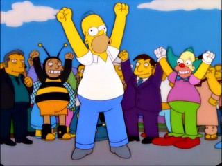 Homer and his fellow plump citizens celebrate Springfield's entry into the record books as the world's fattest town.