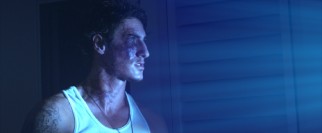 Drawn to the blue light outside, Jarrod (Eric Balfour) gets veiny.