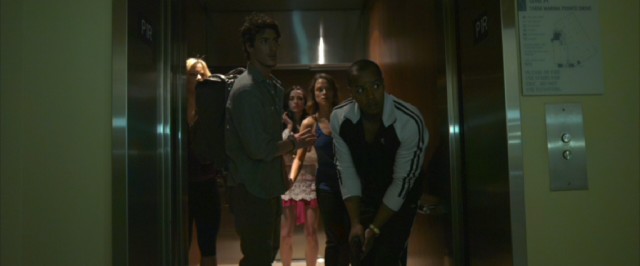 In an effort to avoid killer aliens, the "Skyline" gang moves from elevator to parking garage with caution. This won't end well.