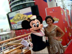 Minnie Mouse and Brenda Song pose together in sailor-esque outfits on the red carpet of The Suite Life on Deck's "Floating Premiere" aboard the Disney Wonder ship.