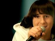 Mitchel Musso and his hair appear in one of their many extreme close-ups for the video "Lean on Me."