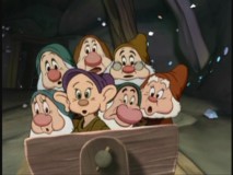 Dopey's Wild Mine Ride Game somehow manages to fit all seven dwarfs in one mine cart.