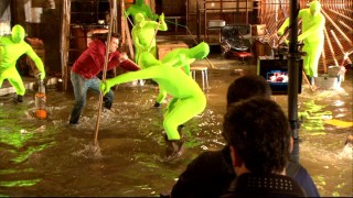 It takes many men in bright green bodysuits to recreate Mickey Mouse's famous mop scene, "The Making of 'The Sorcerer's Apprentice'" reveals.