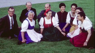 A photo of the real Maria von Trapp and her grown-up children in "Maria and the Musical."
