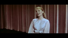 Mia Farrow painfully attempts a verse of "Sixteen Going on Seventeen" in this screen test.