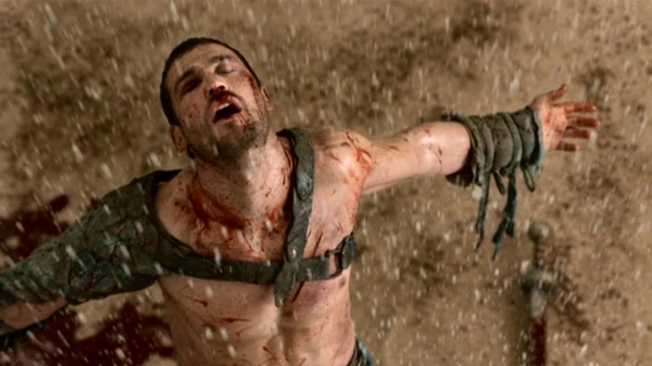 Spartacus (Andy Whitfield) enjoys the feel of falling rain (à la Andy Dufresne) that his longshot victory has evidently brought.