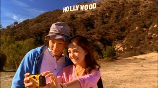 On their day of L.A. sightseeing, Christopher (Sterling Knight) and Jessica (Danielle Campbell) make sure to take a picture of themselves by the landmark Hollywood sign.