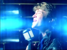 Sterling Knight/Christopher Wilde performs the titular song "StarStruck" (that's one word with two capitals) in a blue-lit music video.