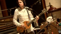 Composer Jon Brion plays guitar in the featurette that celebrates his "Step Brothers" music.
