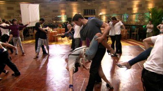 "Extra Moves" shows the dance crew practicing the tango in casual wear.