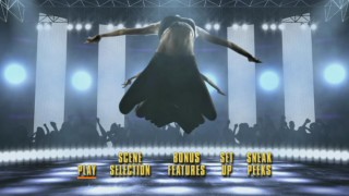 Natalie makes a dramatic leap that leaves a trail behind her in the stylized "Step Up 3" main menu.