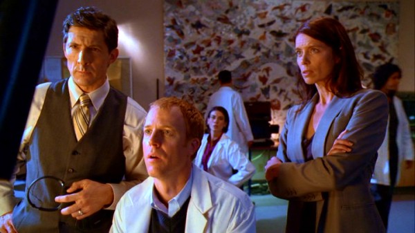 Suspect scientific jargon flows as Dr. John Trousdale (Peter Wingfield), David (David Lewis), and Dr. Kaycee Leeds (Torri Higginson) examine and interpret Stonehenge's electromagnetic readings.