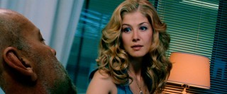 Utterly dependent on her beautician surrogate, Greer's wife Maggie (Rosamund Pike) is a bit disturbed to see her husband in his own flesh.