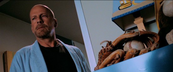 Dutch angles abound in "Surrogates", as in this early shot revealing the real Agent Greer (Bruce Willis) stopping in his dead son's room.