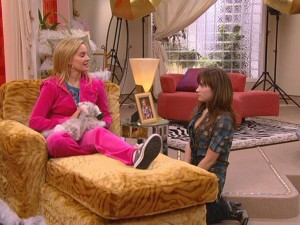 Sonny (Demi Lovato) is so taken aback by Tawni's (Tiffany Thornton) devotion to a plush kitten that she fails to pull up a seat for herself.