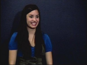 In her audition tape, Demi Lovato excitedly performs an early version of the scene where she first meets the "So Random" cast.