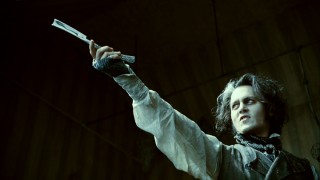 Sweeney Todd admires his razor blade on a number of occasions, this being one of the prouder.