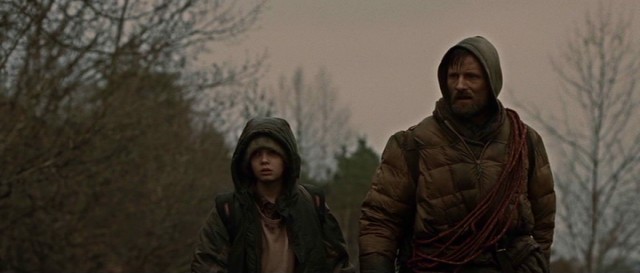 This is about as bright as things get in "The Road", a post-apocalyptic drama about a young boy (Kodi Smit-McPhee) and his father (Viggo Mortensen) struggling to stay alive in a dying world rid of plants and animals.