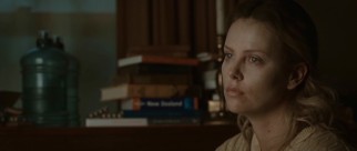 The cast's leading female, Charlize Theron's Wife character, is seen in intermittent flashback, some quite a bit more colorful than the film's heavily-muted regular palette.