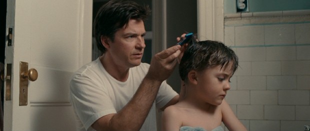 More than the advertised romance, "The Switch" invests in the relationship between father (Jason Bateman) and son (Thomas Robinson), seen here combatting a case of lice with a fine tooth comb.