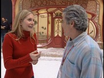 The director chats with Mrs. Calvin/Clause to convince Disney that all is well inside the North Pole.