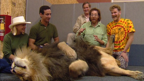 Directors Rob Minkoff and Roger Allers are among those getting an up-close look at a sleepy lion during the making of "The Lion King."