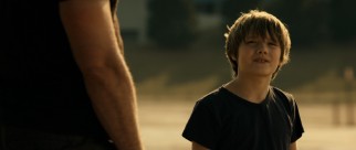 Talk about a win-win situation: Max Kenton (Dakota Goyo) gets to know his father and co-manage a robot boxer.