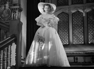 Mrs. de Winter (Joan Fontaine) picked the wrong dress with which to surprise Maxim at the estate's costume ball.