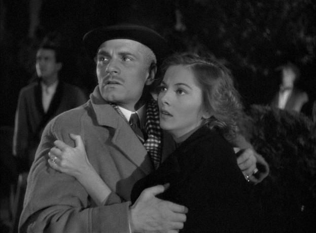 Maxim (Laurence Olivier) and Mrs. de Winter (Joan Fontaine) hold each other in the explosive finale of "Rebecca."