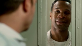Kerwin (Johnny Ray Gill), Daniel's closest friend on death row, expresses his faith in his next-cell neighbor.