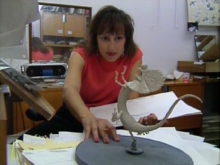 Supervising animator Kathy Zielinski consults a model while drawing Frank in "The Making of 'The Rescuers Down Under'."