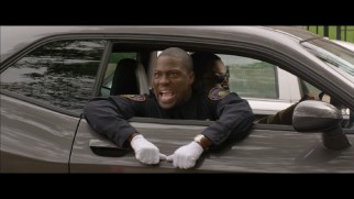 Ben (Kevin Hart) graduates from the Police Academy in this alternate ending.