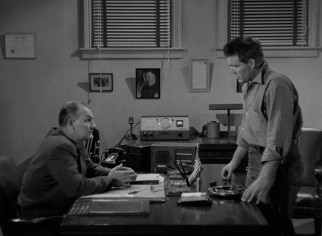 Neither the Warden (Emile Meyer) nor Dunn (Neville Brand) is pleased with the outcome of the prison riot.