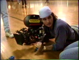 Director Robert Rodriguez gets low to shoot a "RoadRacers" roller rink scene in the behind-the-scenes footage from "Ten Minute Film School: The Making of a Degenerate Hot Rod Flick."