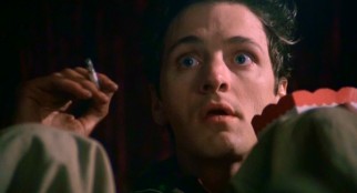 Nixer (future Academy Award nominee John Hawkes) is riveted at an "Invasion of the Body Snatchers" screening.