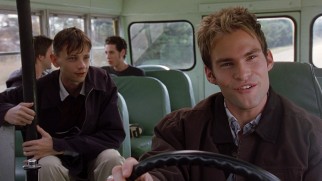 E.L. (Seann William Scott) mans the wheel of the blind school's school bus he stole.