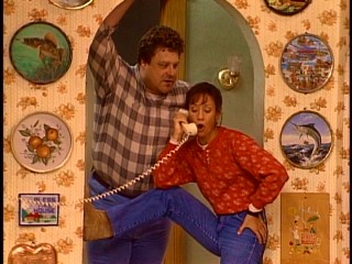 Dan (John Goodman) sees a lot more of Jackie (Laurie Metcalf) at his house than he would like to, or so says the running gag.