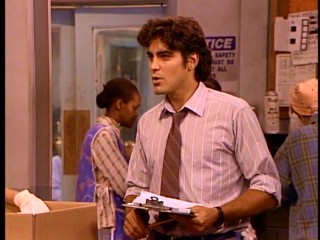 Before he became a star of "ER" and leading man of film, George Clooney held a recurring role as Roseanne's boss Booker Brooks.