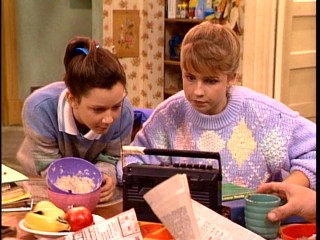 Darlene (Sara Gilbert) and Becky (Lecy Goranson) are like night and day, but they both appreciate a breakfast morning radio listen when it means a potential school closing.