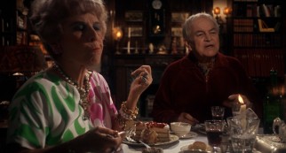 The Castevets, Minnie (Oscar-winning supporting actress Ruth Gordon) and Roman (Sidney Blackmer), waste no time extending a dinner invitation.